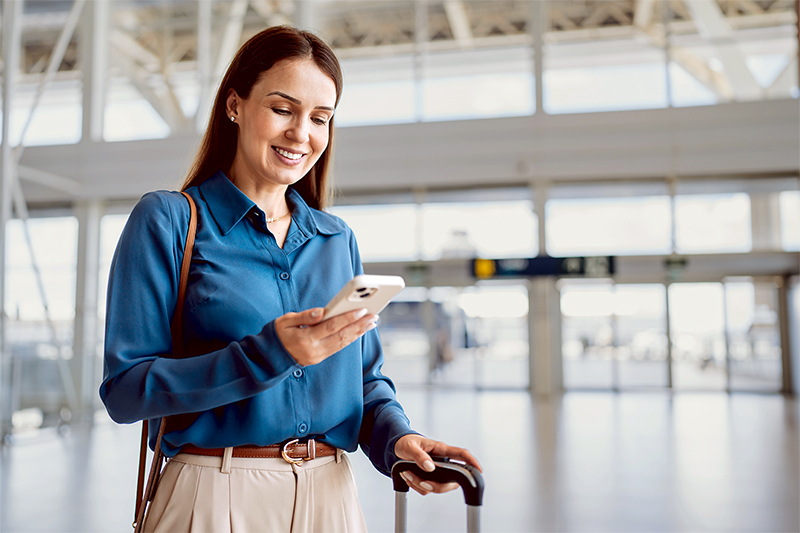 Woman with luggage at airport